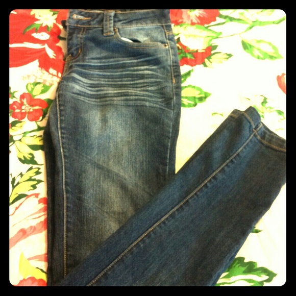 Dark blue faded jeans