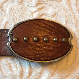 Brown leather belt with brass studs