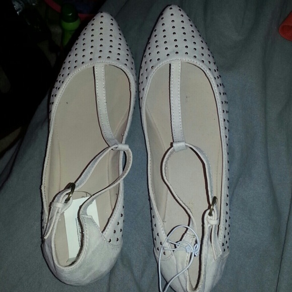 Stud flat and tan flat ( 2 pairs ) on hold