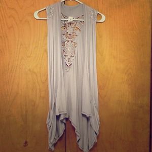 Light gray sleeveless cardigan