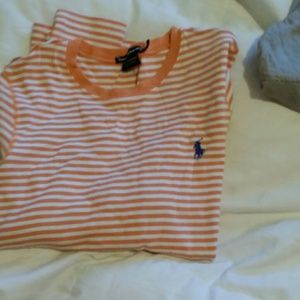 White and little peach shirt