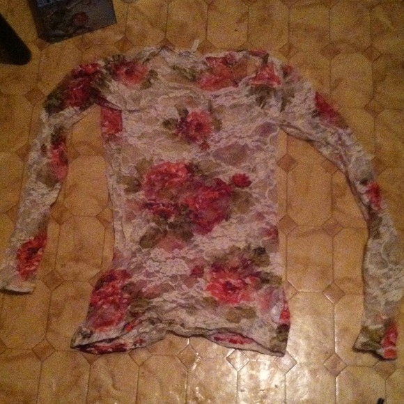 Kirra floral lace shirt with rose print on it