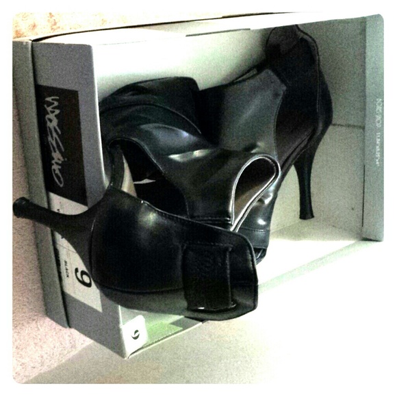 Valentina,  gently worn.  Comfortable and shick.