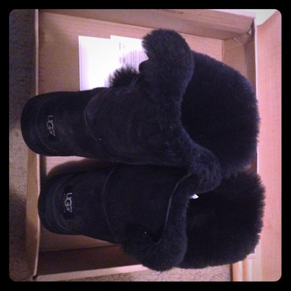 black Ugg boots w/ Bailey Button .