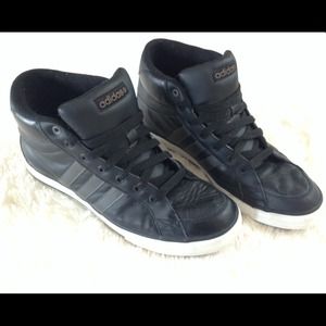 Pair of hight top black David Beckham Adidas.