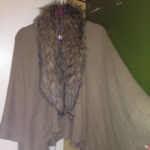 Faux fur throw over sweater