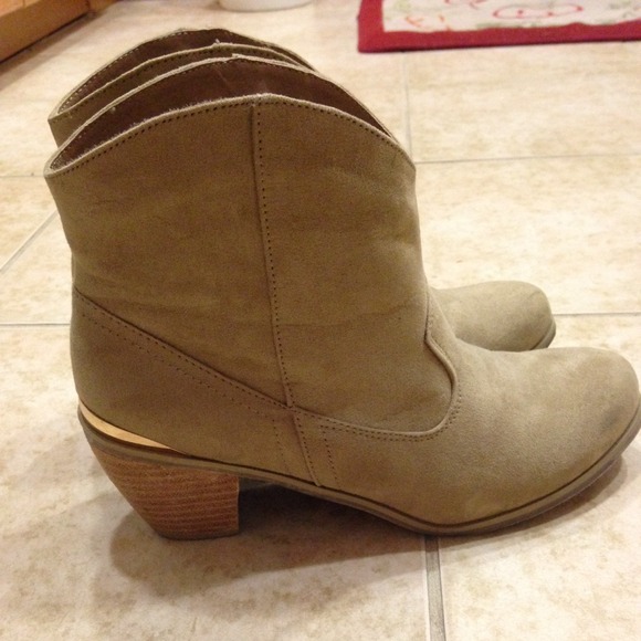 Beige with gold medal detailing on the ankle