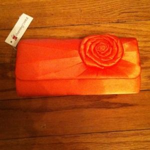 NWT orange clutch!