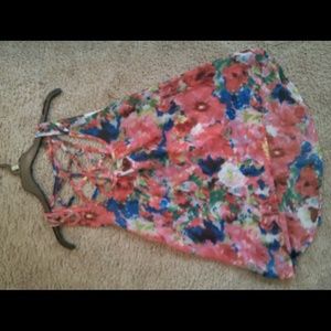 Flowered sheer tank top w/Amazing cut out in back.