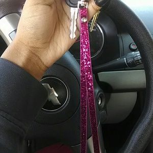 Pink key chain.