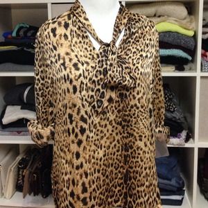 Leopard print blouse with pussy bow tie
