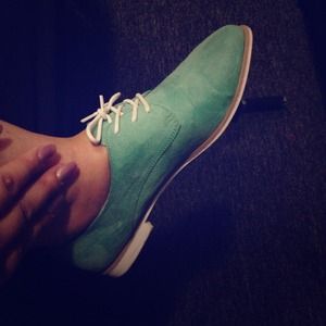 Mint color loafer style shoes
