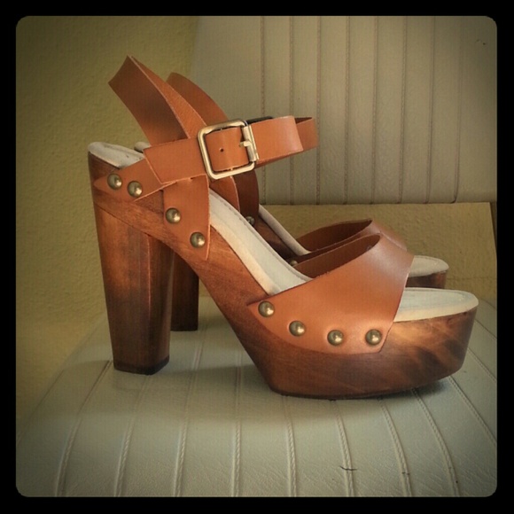 Never worn leather and wood platform sandals