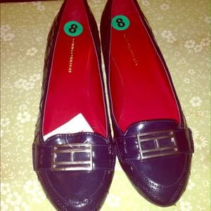 Blue Tommy Hilfiger flats.