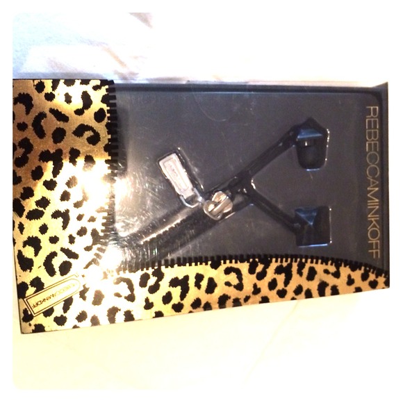Rebecca Minkoff  zipped up pyramid earbuds