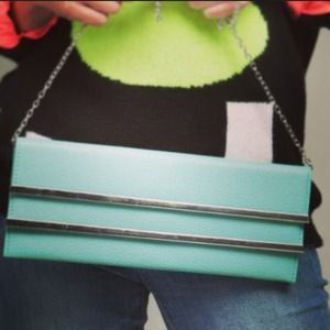 🔴sold Mint blue folded clutch