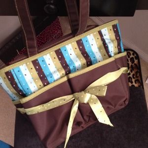 Mini diaper bag with bottle holder