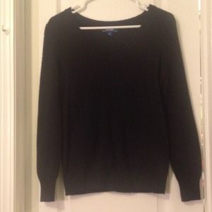 Black v-neck sweater.