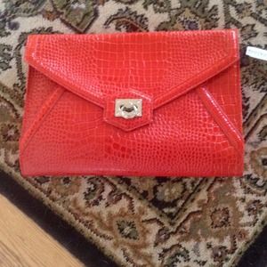 Brand new red envelope clutch.....REDUCED!