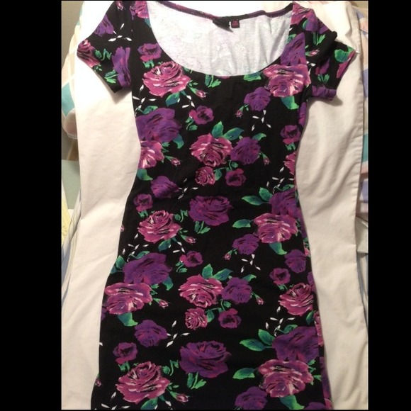 Bodycon dress, black base with purple flowers.