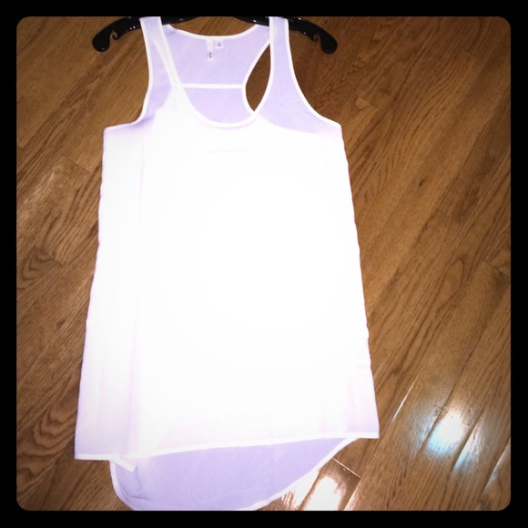 Stylish White top. Nice fabric.