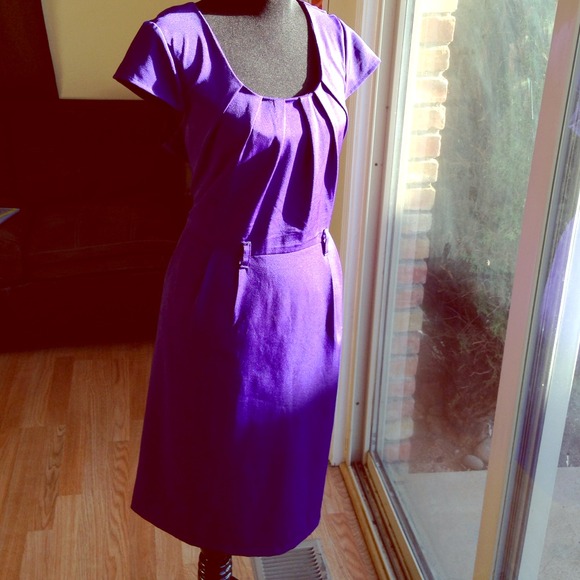 Purple Olivia Matthews dress.
