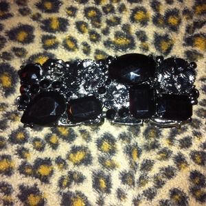 2 elastic banded bracelets.