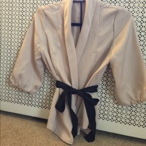 SOLD Beige fly-away jacket with a black belt