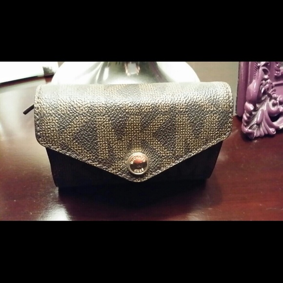 MK little wear but I enjoy it got new one