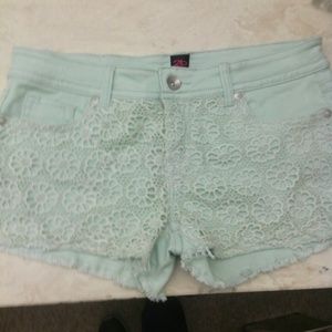 Teal shorts with lace front