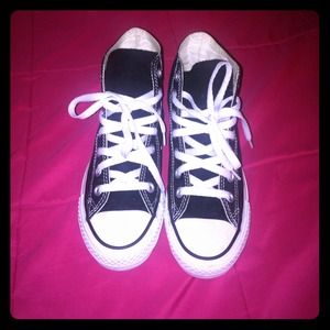 Black and white, high top converse.