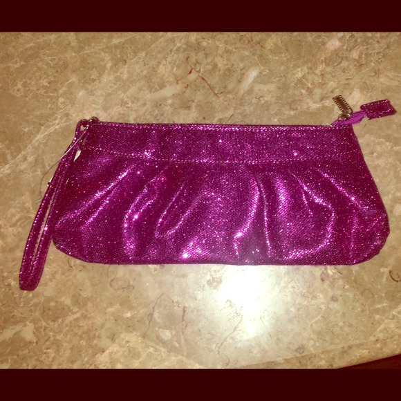 Purple sparkly clutch purse.