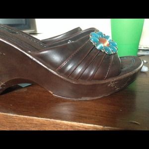 Brown heels, scratches on heel