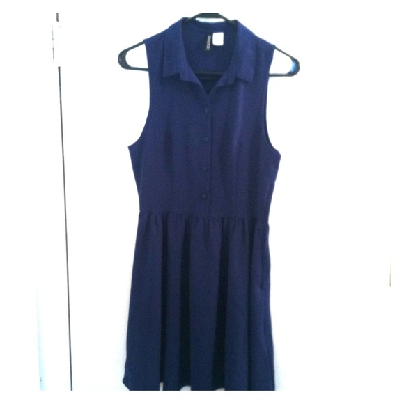 Royal blue collared button up dress.