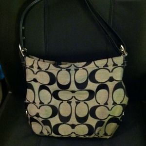 Black crossover/over the shoulder hand bag