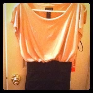 Pink sparkly and black dress.