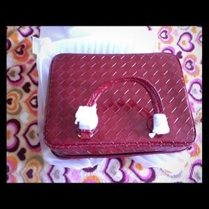 Estee Lauder purse with makeup