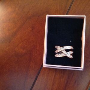 Swarovski Rose gold colored finger ring. Size 7
