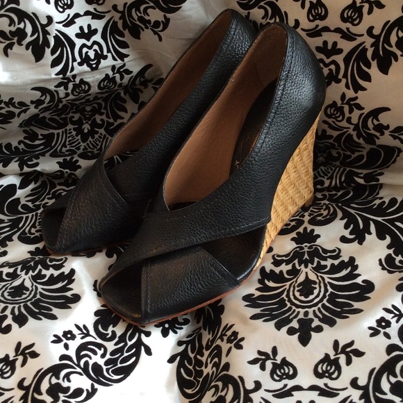 BCBG woven black leather wedges.  Mismates NEW