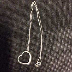 Price lowered.White Gold/SterlingHeart and Chain??