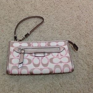 Cute pink coach wristlet!