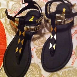 Brand new Charlotte Russe black and gold sandals!
