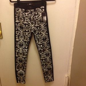Black and white patterned denim jeans
