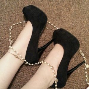 Black suede pumps