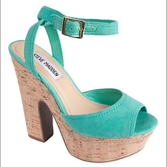 Steve Madden blue ankle strap cork heel.