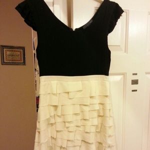 Ruffled black and cream dress