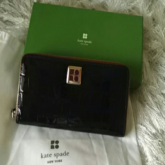 Kate Spade leather wallet in burgundy