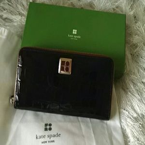 Kate Spade leather wallet in burgundy