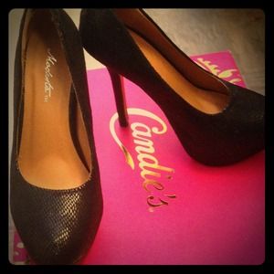 Sleek black high pump.