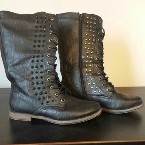 Tall spiked boots